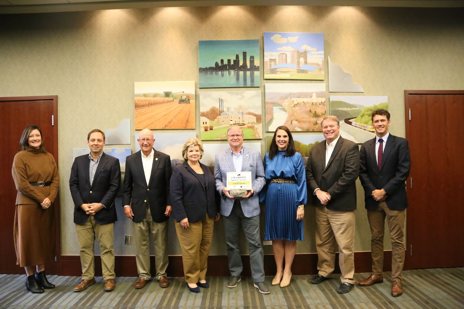 SENATOR DAMON THAYER IS OFFICIALLY PRESENTED CHAMPION FOR SIGNATURE INDUSTRIES AWARD